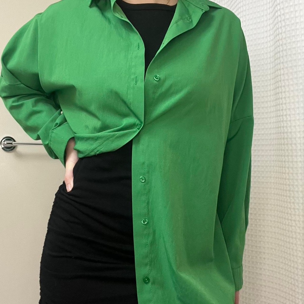 Green button up shirt